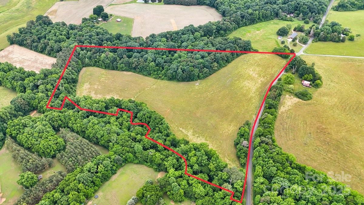 0 Pennington Road Albemarle, NC 28001 - Photo 8 of 10 a view of a garden with plants and large trees
