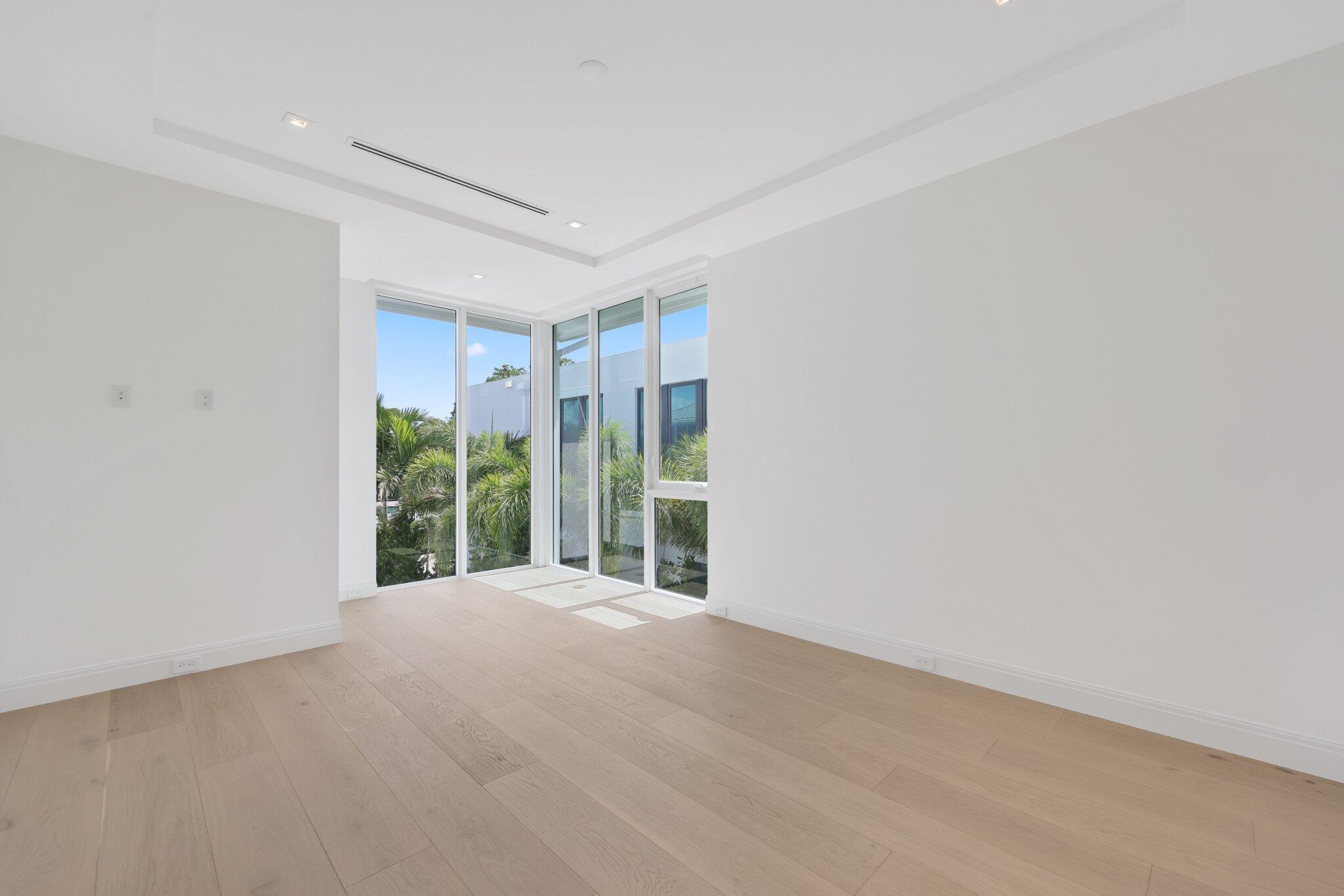 320 Grove Place Delray Beach, FL 33444 - Photo 42 of 85 a view of a big room with windows and closet area