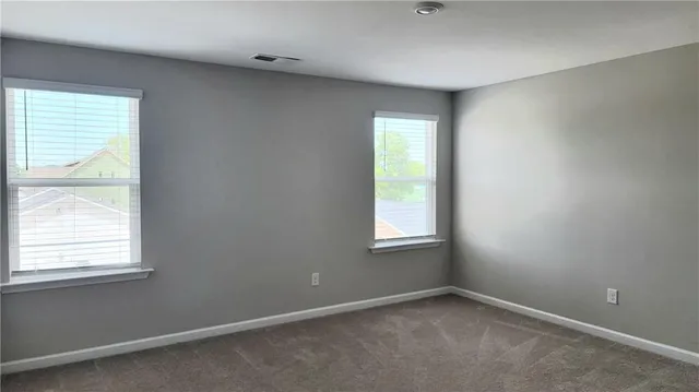 an empty room with a window