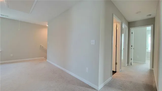 a view of hallway with closet