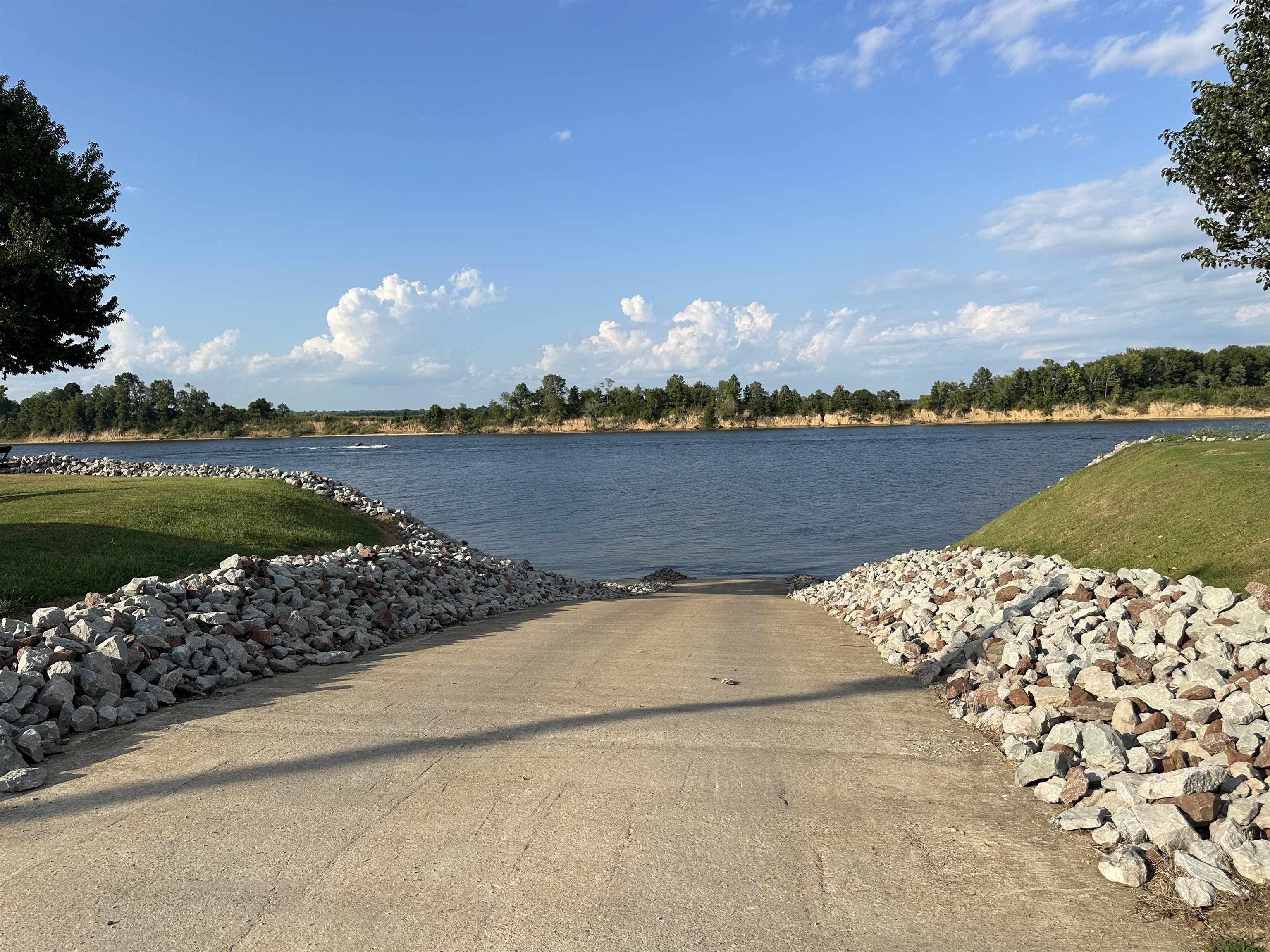 135 Jaycee Lane Adamsville, TN 38310 - Photo 13 of 14 a view of a lake with a lake