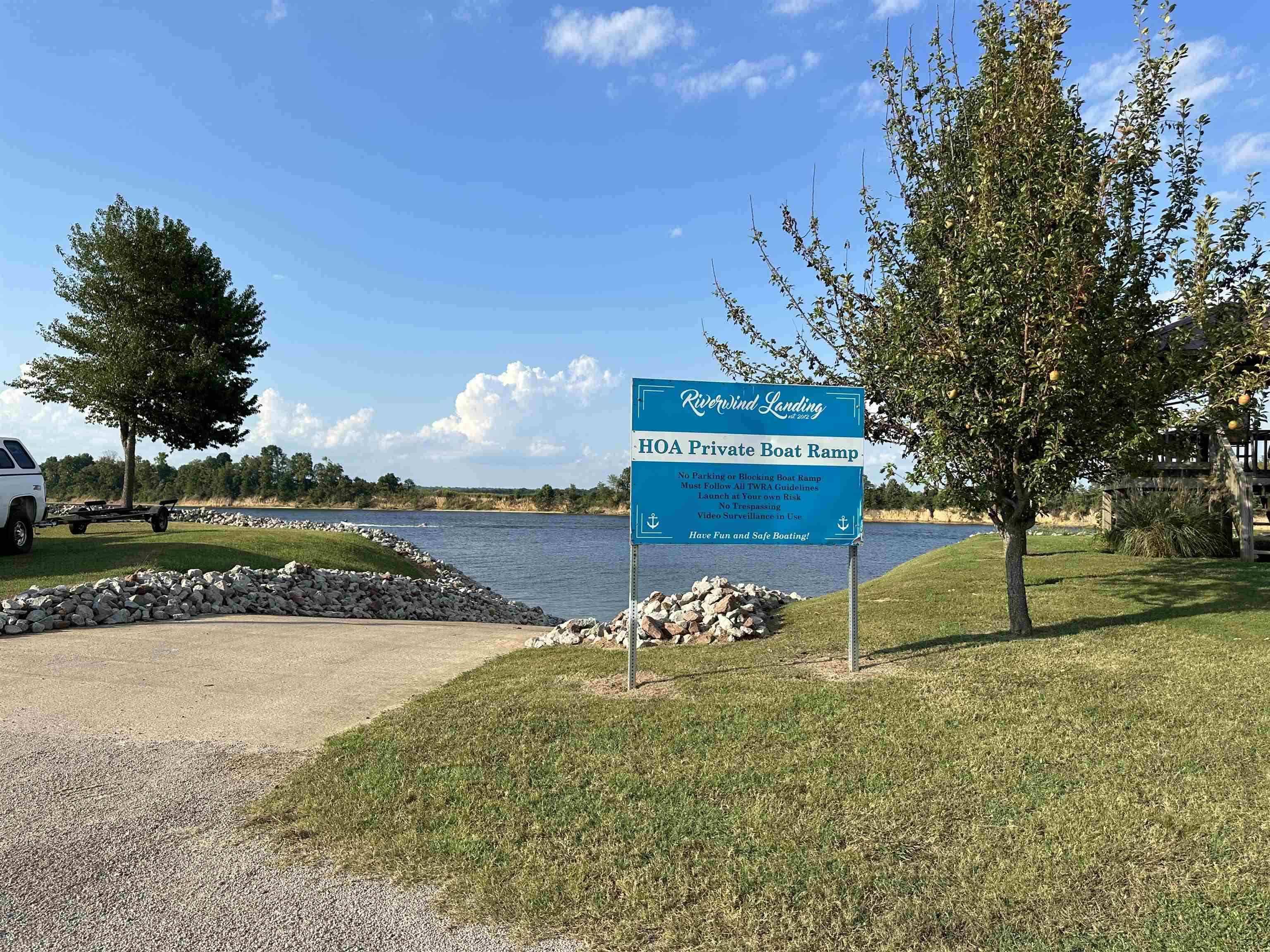 135 Jaycee Lane Adamsville, TN 38310 - Photo 14 of 14 a view of a house with a yard