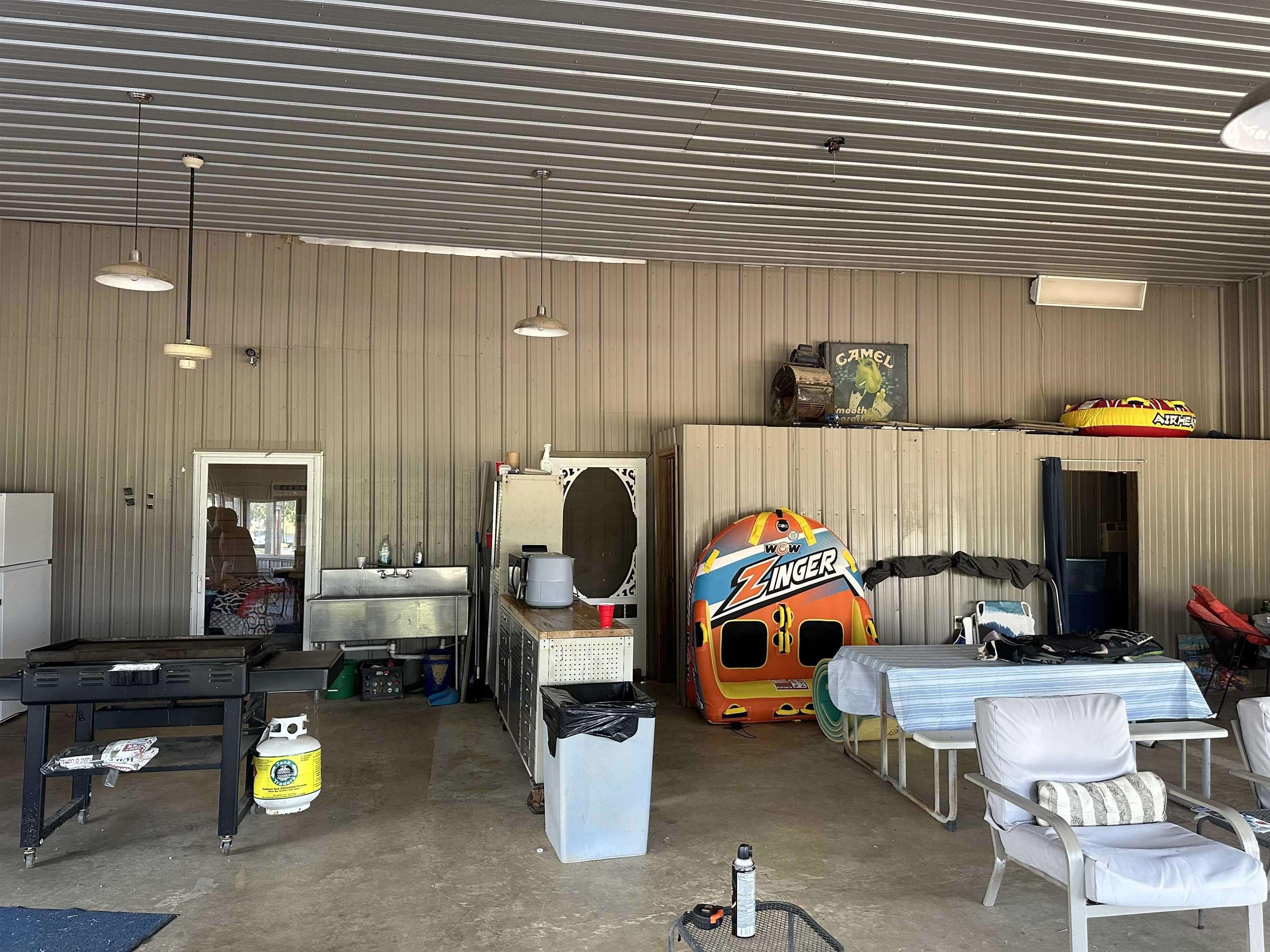 135 Jaycee Lane Adamsville, TN 38310 - Photo 6 of 14 a view of storage and utility room