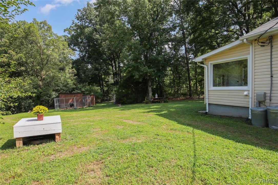 12401 2nd Branch Road Chesterfield, VA 23838 - Photo 31 of 41 a backyard of a house with lots of green space
