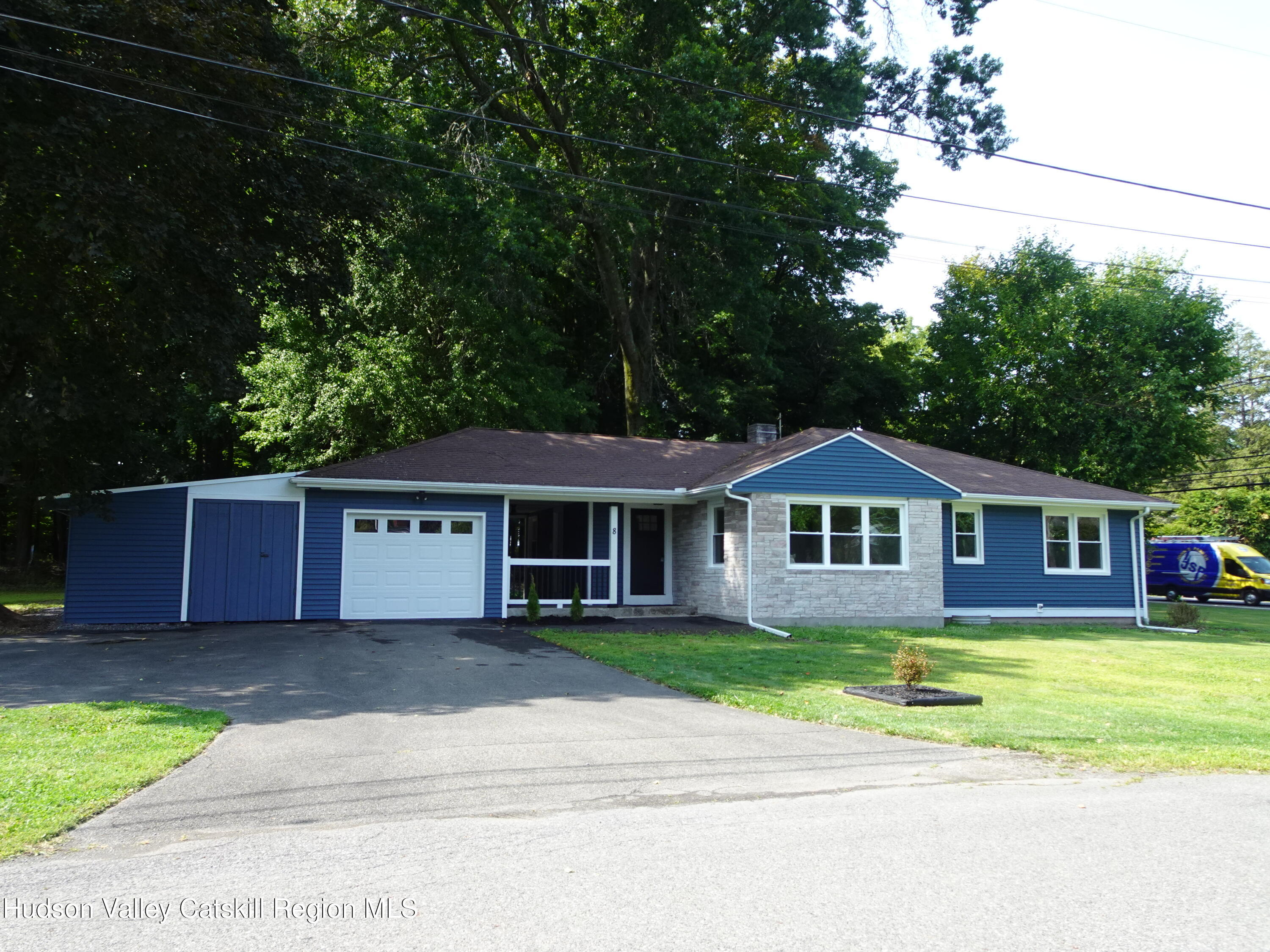 8 Hover Road Claverack-Red Mills, NY 12513 - Photo 2 of 33 a front view of a house with a garden and yard
