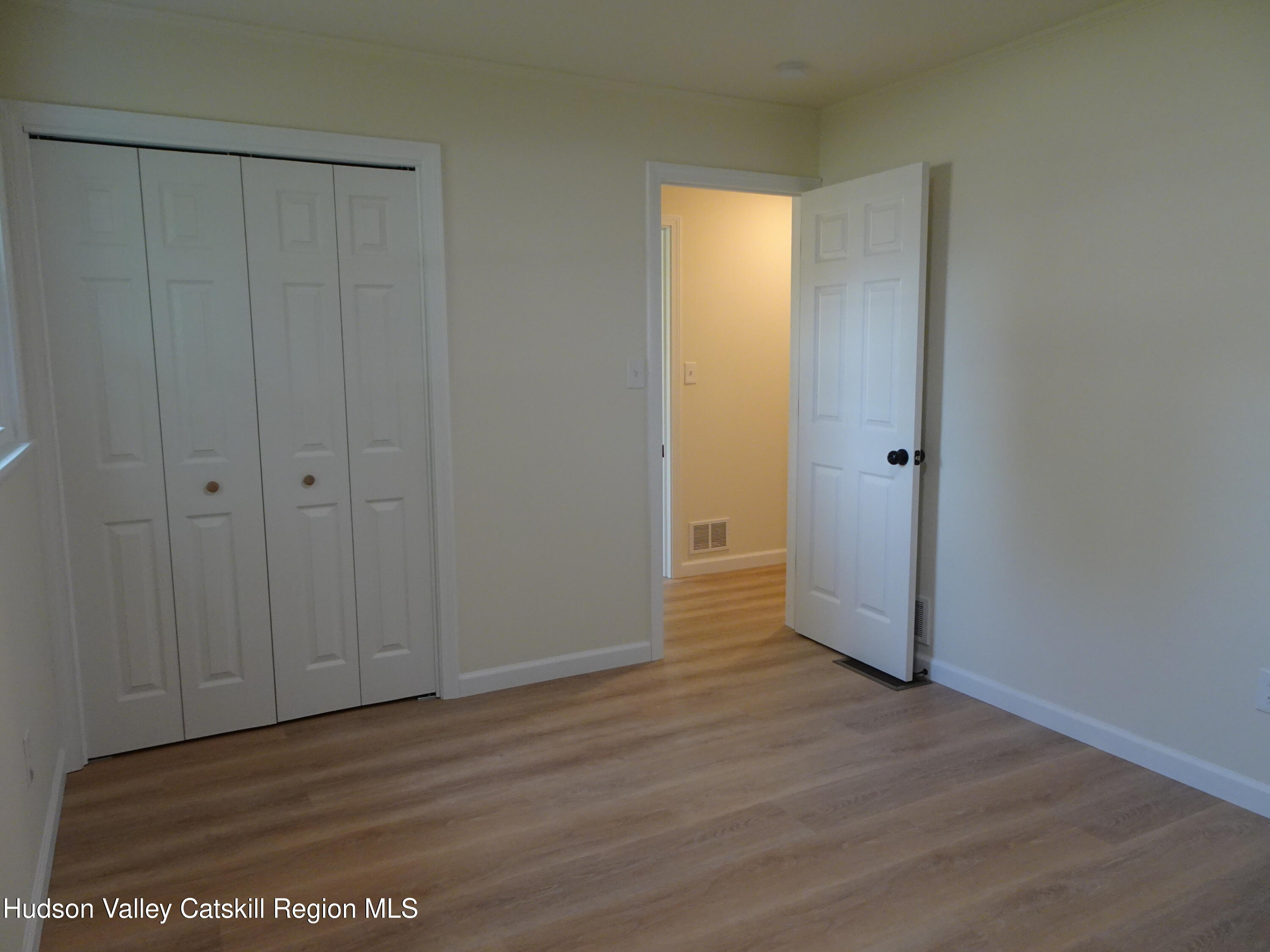 8 Hover Road Claverack-Red Mills, NY 12513 - Photo 23 of 33 a view of an empty room with wooden floor