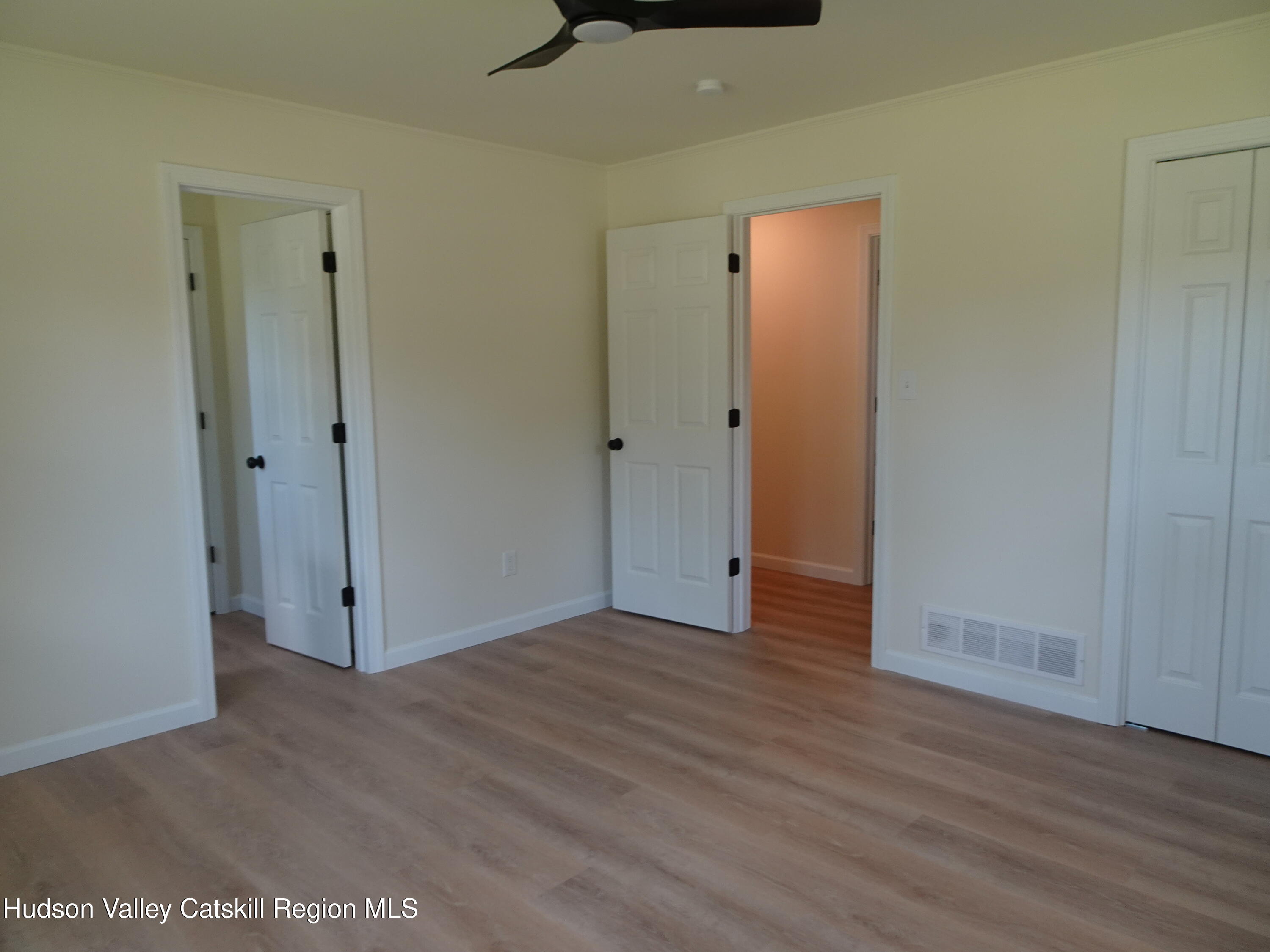 8 Hover Road Claverack-Red Mills, NY 12513 - Photo 24 of 33 a view of an empty room with wooden floor and closet