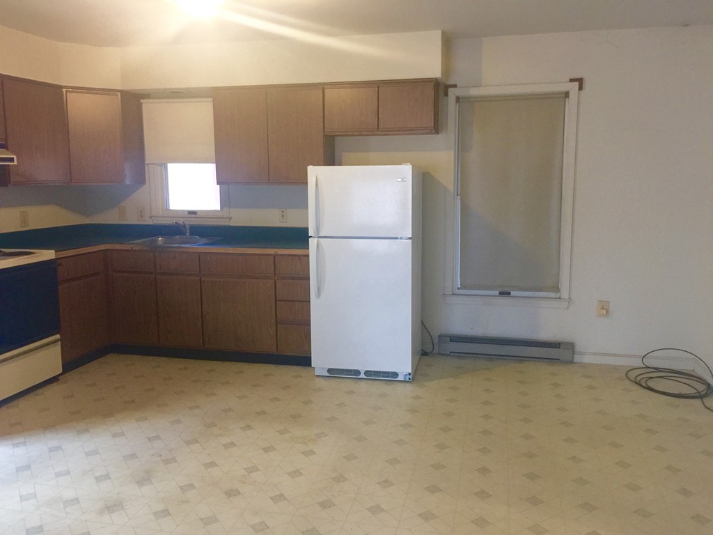125 Rocky Hill Road Hadley, MA 01035 - Photo 8 of 12 a kitchen with a cabinets