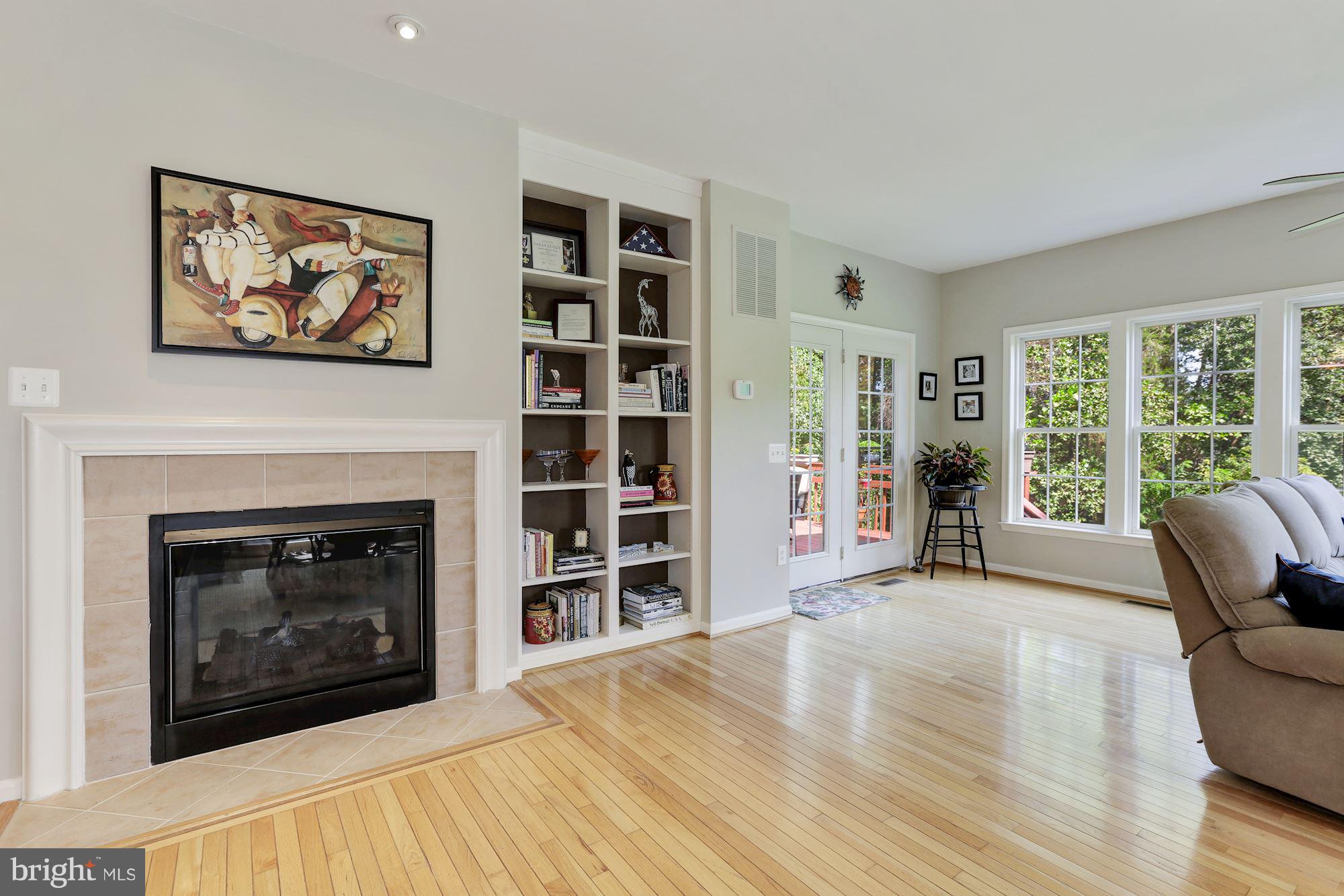 6103 Traceys Overlook Road Tracys Landing, MD 20779 - Photo 10 of 30 Family room dual-sided fireplace
