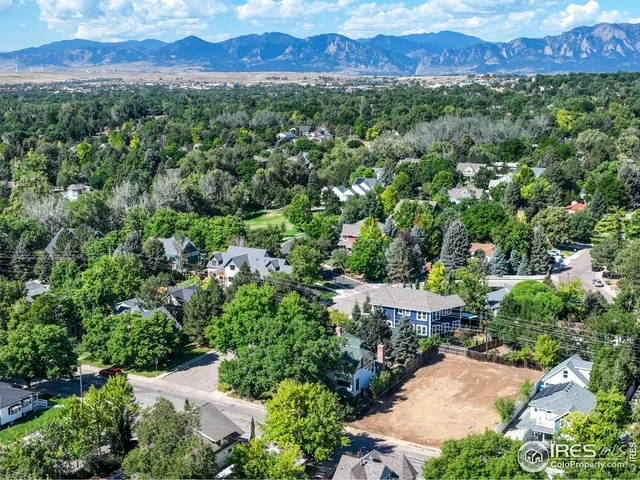 a view of a street with sitting area