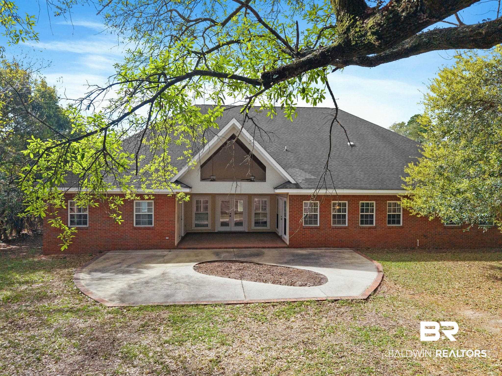 3668 Claridge Road North Mobile, AL 36608 - Photo 85 of 100 Rear view of property featuring french doors, brick siding, a patio area, and a yard