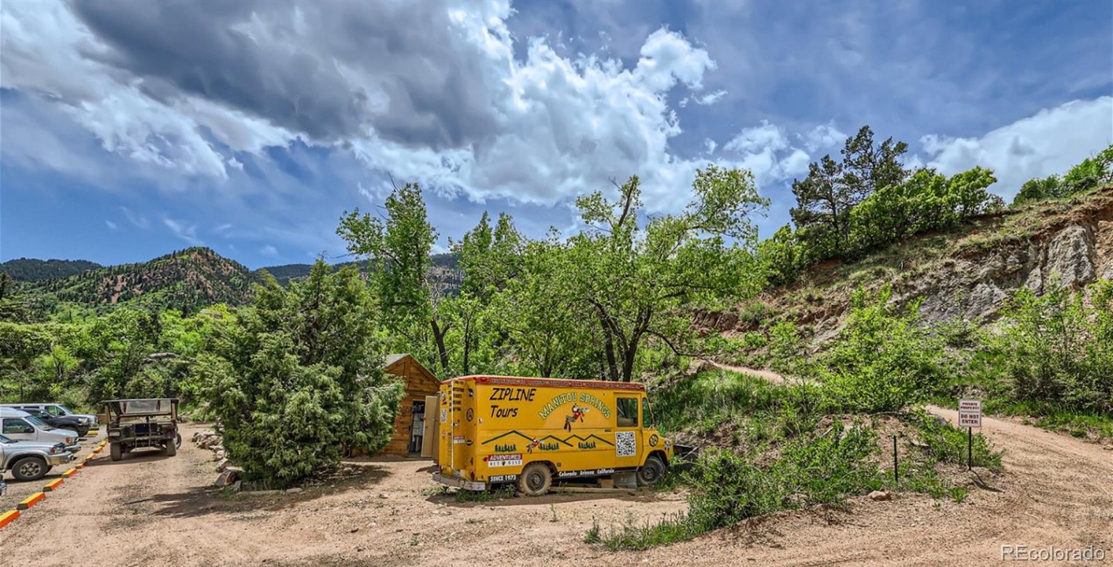 8962 Blue Feather Loop Colorado Springs, CO 80908 - Photo 17 of 18 a view of a yard with plants and trees