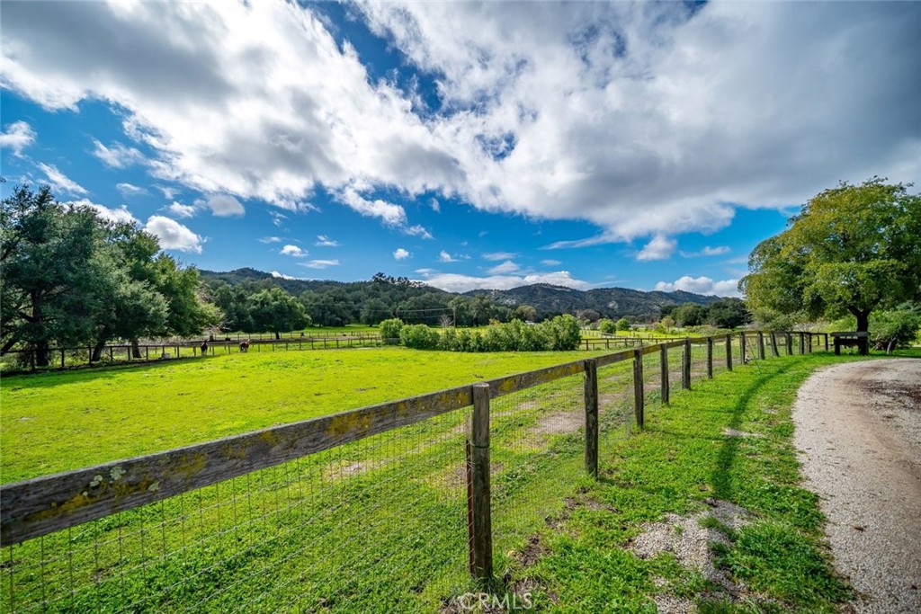 1825 Hi Mountain Road Arroyo Grande, CA 93420 - Photo 15 of 74 a view of a lake with a big yard
