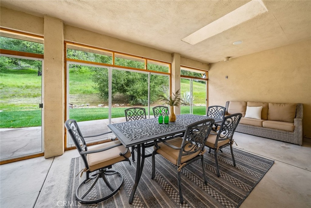 1825 Hi Mountain Road Arroyo Grande, CA 93420 - Photo 23 of 74 a view of a dining room with furniture window and outside view
