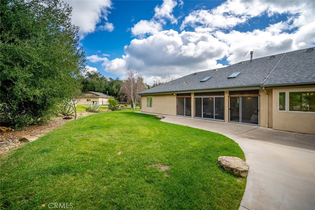 1825 Hi Mountain Road Arroyo Grande, CA 93420 - Photo 26 of 74 a view of a house with a backyard