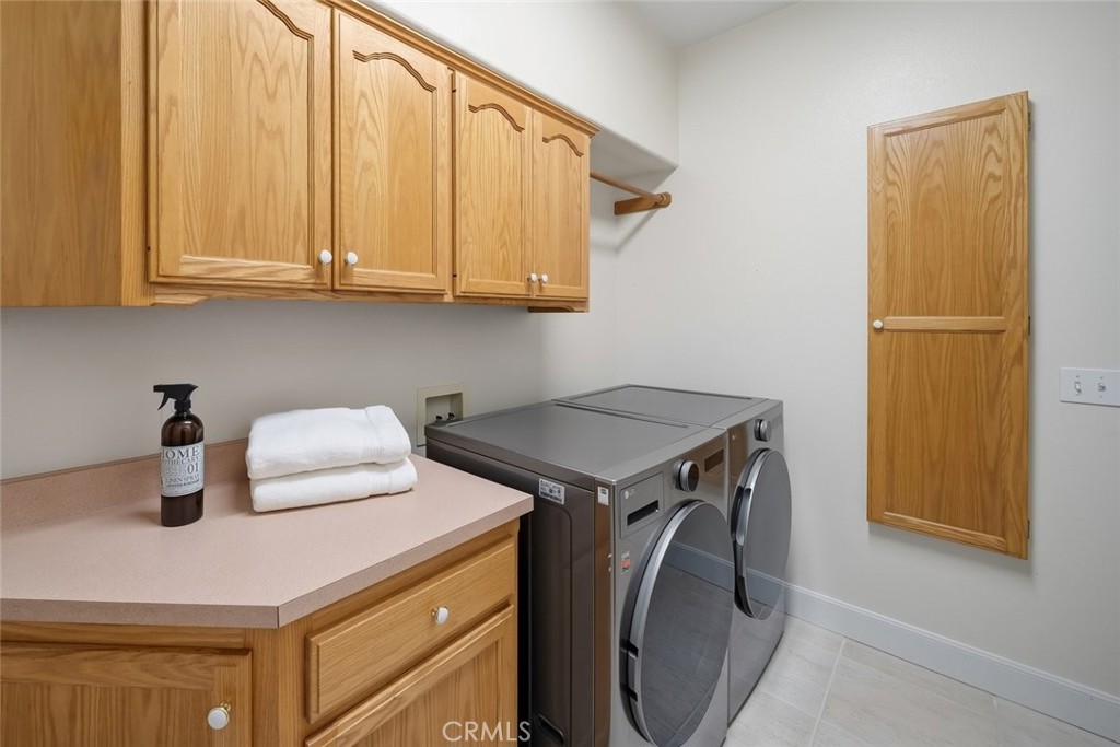 1825 Hi Mountain Road Arroyo Grande, CA 93420 - Photo 40 of 74 a utility room with dryer and washer