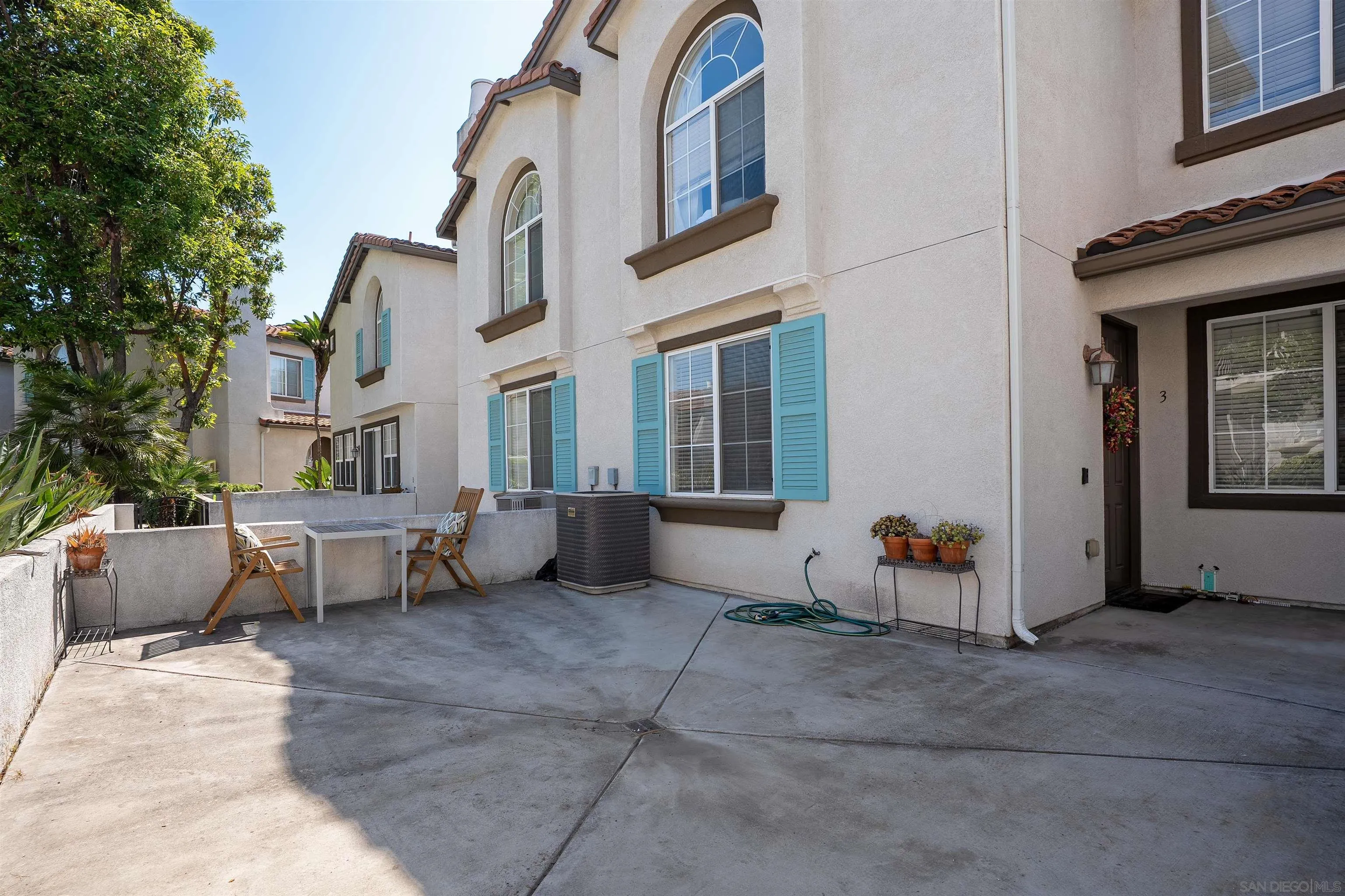 289 Reef Point Way, Unit 3 Oceanside, CA 92058 - Photo 18 of 23 a view of an outdoor space with porch and couch