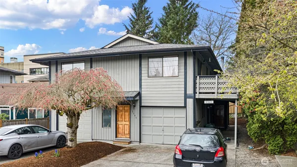 a car parked in front of a house