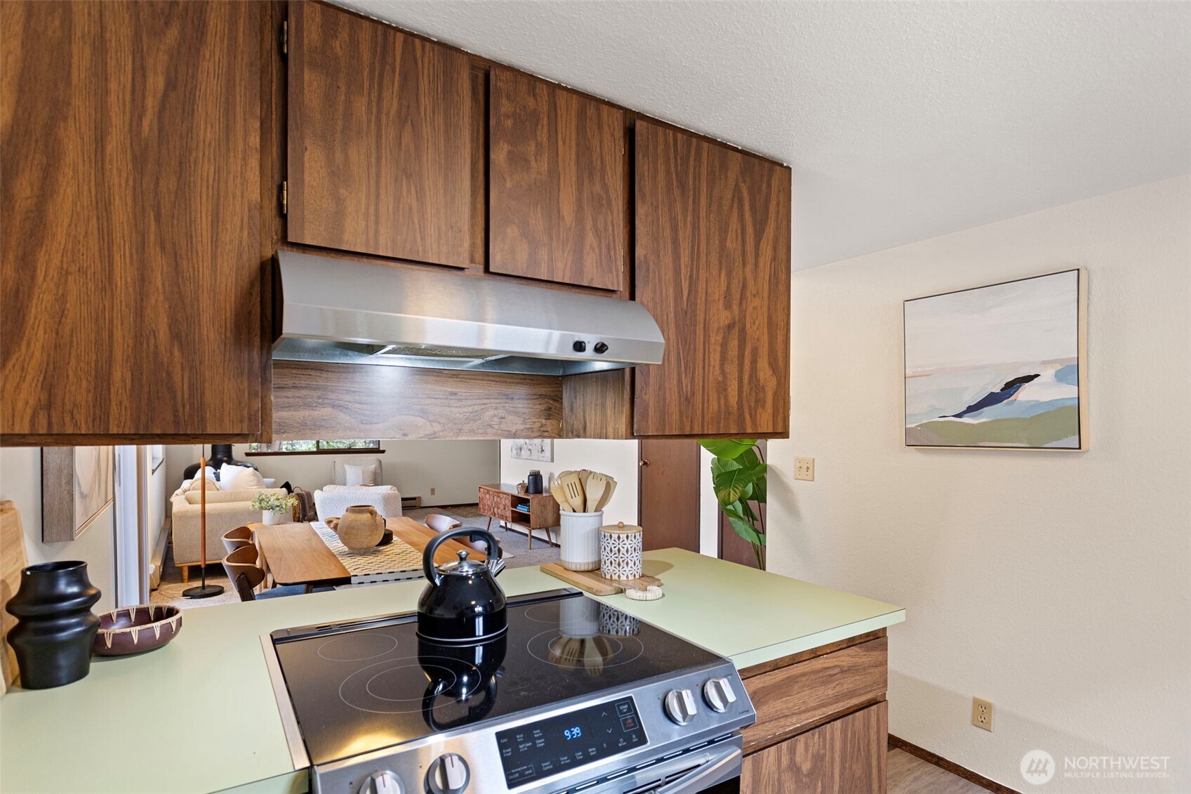 9545 Interlake Avenue North Seattle, WA 98103 - Photo 14 of 32 a kitchen with a sink cabinets and window