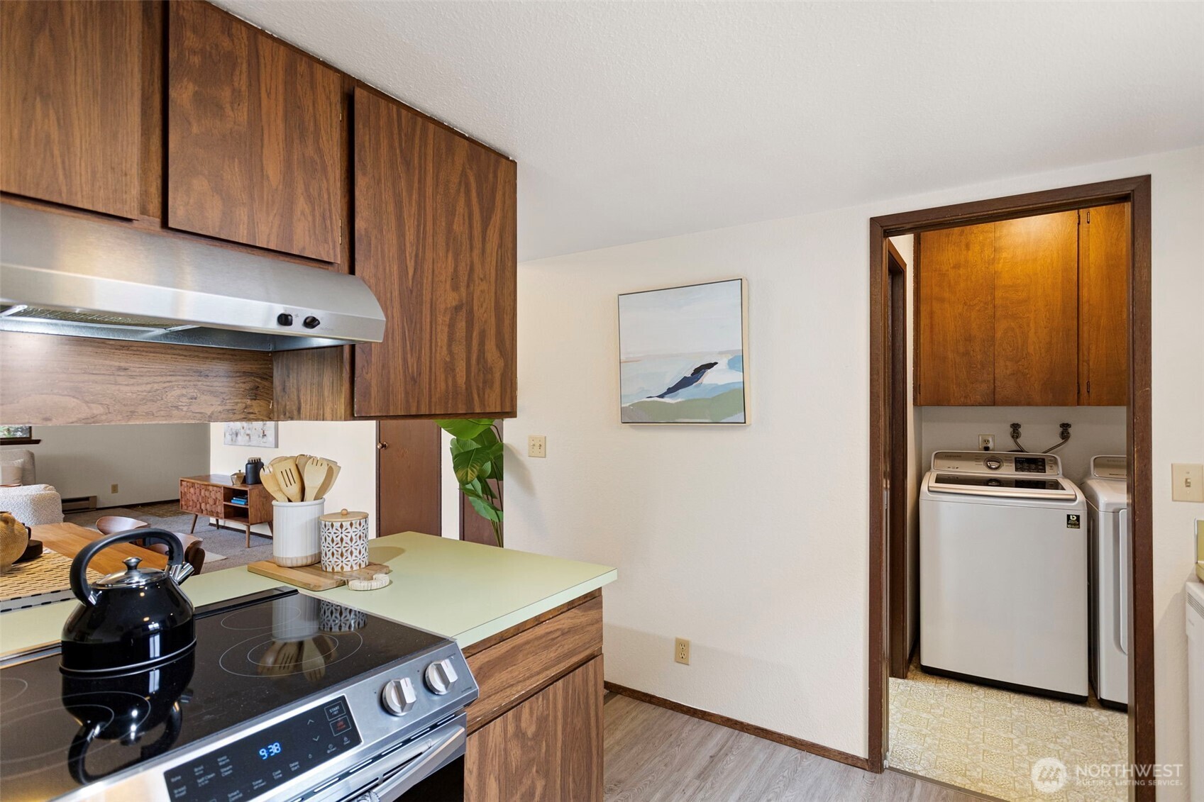 9545 Interlake Avenue North Seattle, WA 98103 - Photo 16 of 32 a kitchen with a stove and a refrigerator