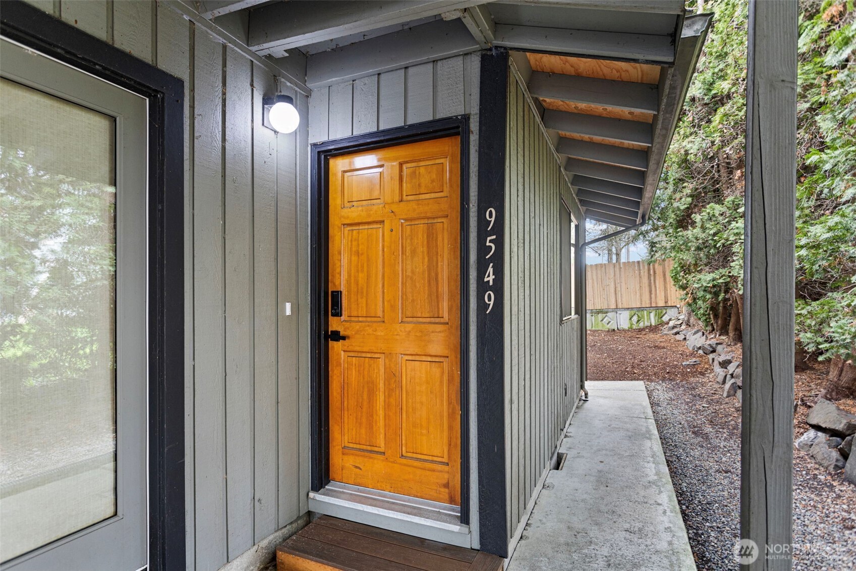 9545 Interlake Avenue North Seattle, WA 98103 - Photo 2 of 32 a view of a front door of the house and a yard