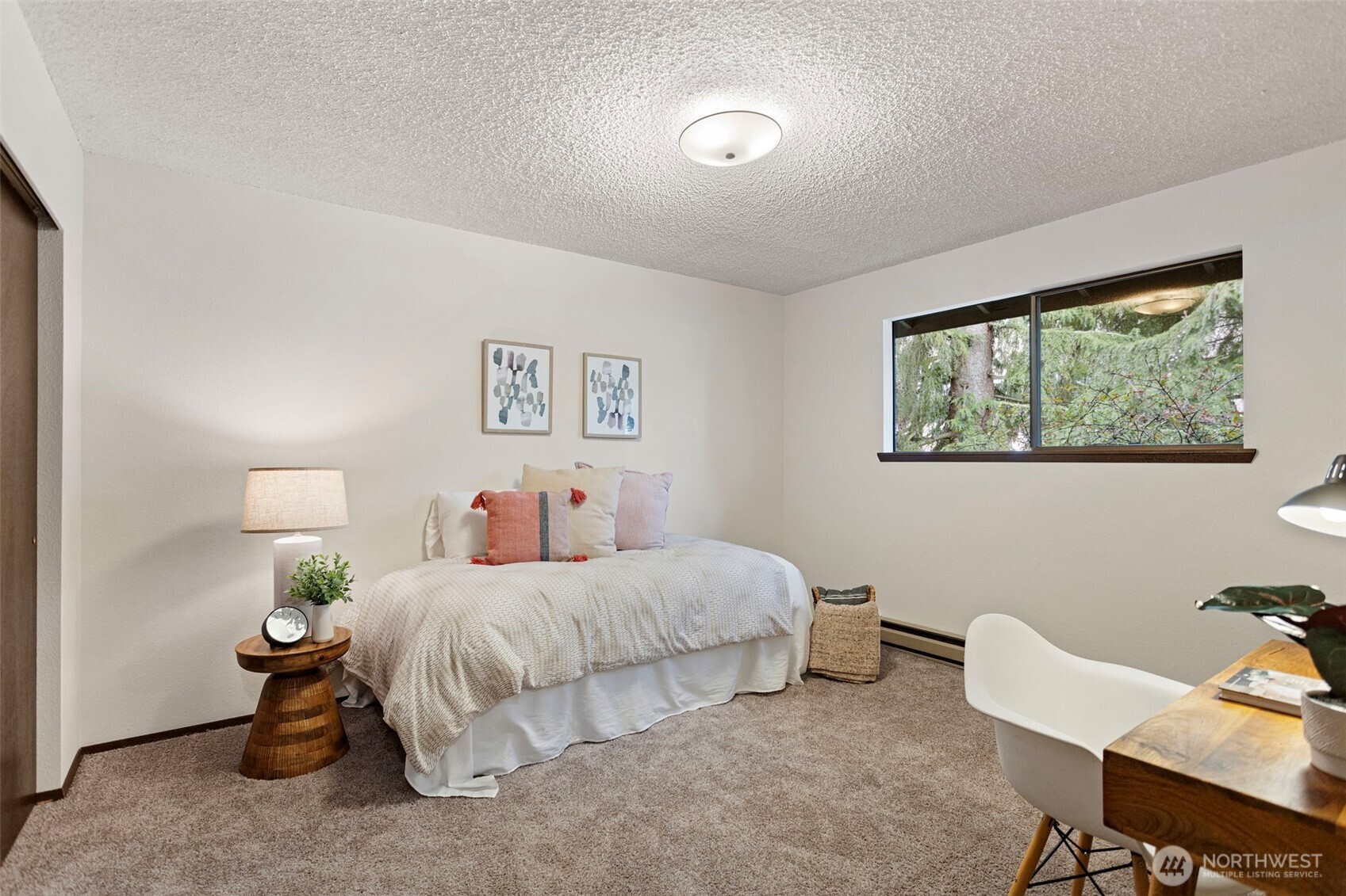 9545 Interlake Avenue North Seattle, WA 98103 - Photo 25 of 32 a bedroom with two beds and a table