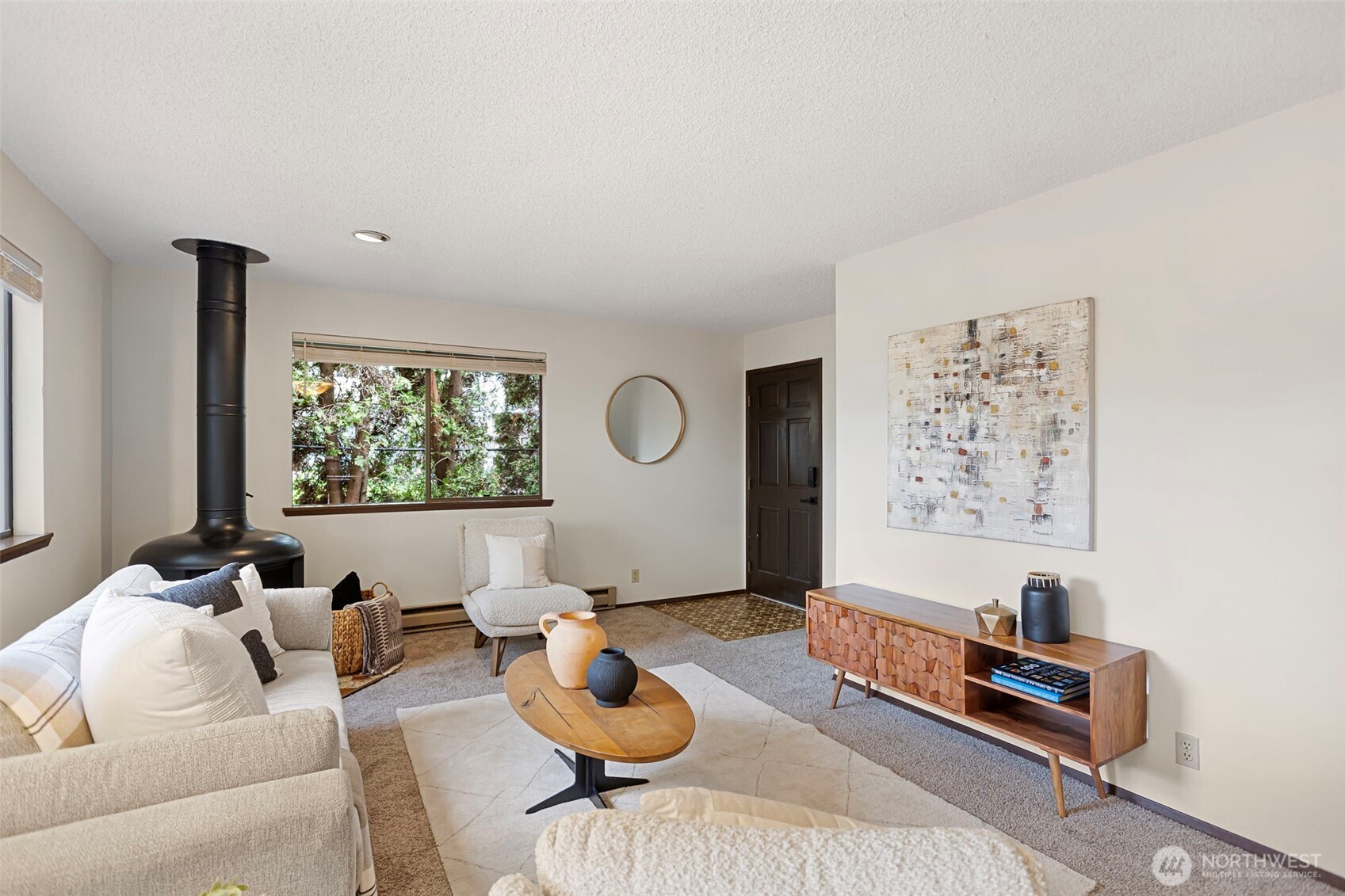 9545 Interlake Avenue North Seattle, WA 98103 - Photo 6 of 32 a living room with furniture and a window