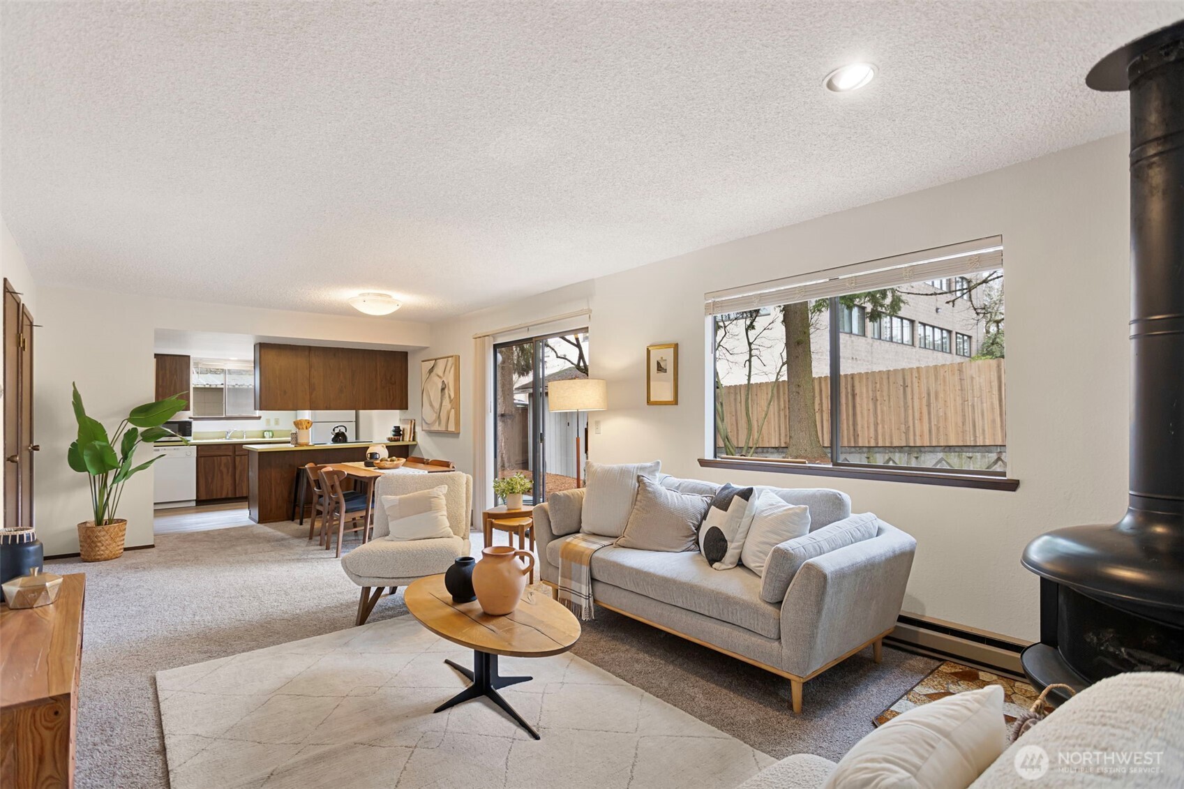 9545 Interlake Avenue North Seattle, WA 98103 - Photo 7 of 32 a living room with furniture and a large window