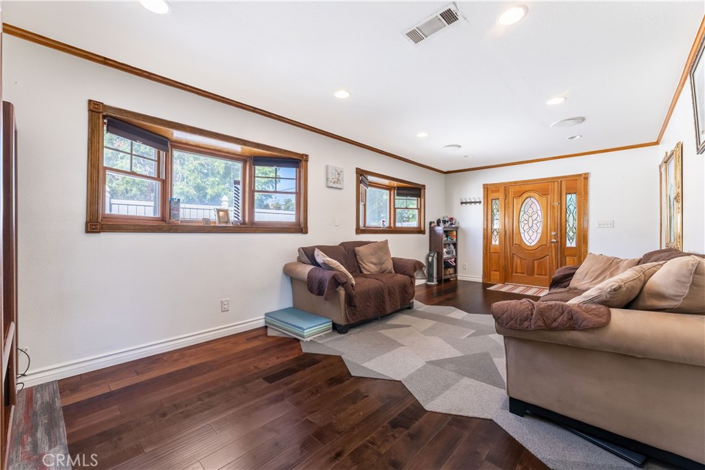 11203 Sheldon Street Sun Valley, CA 91352 - Photo 11 of 57 a living room with furniture and a window