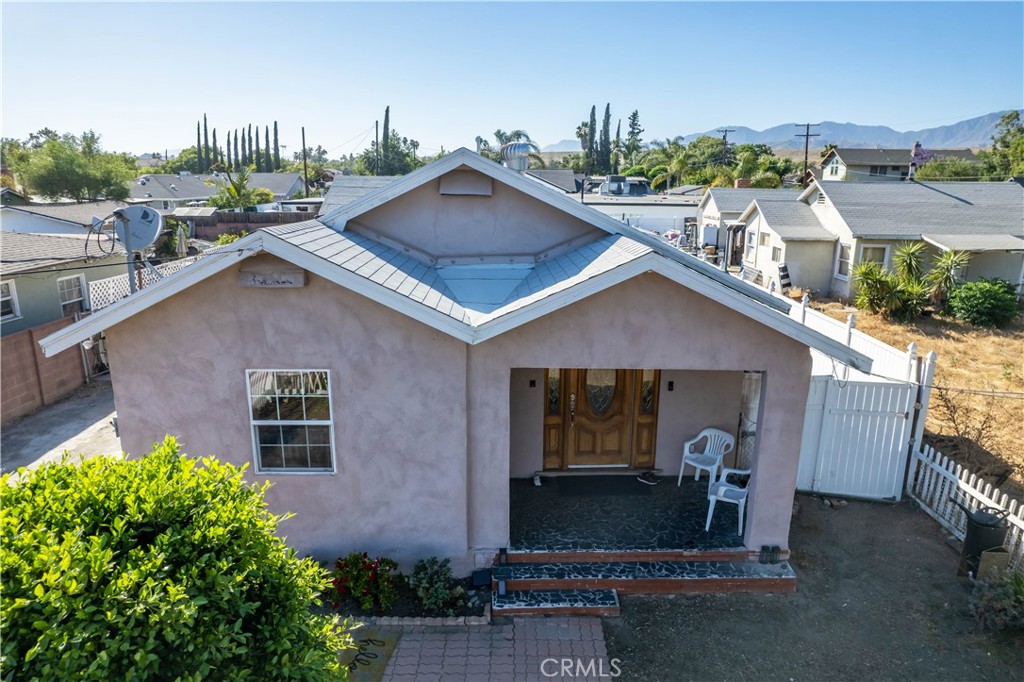 11203 Sheldon Street Sun Valley, CA 91352 - Photo 2 of 57 a view of a house with a yard and potted plants