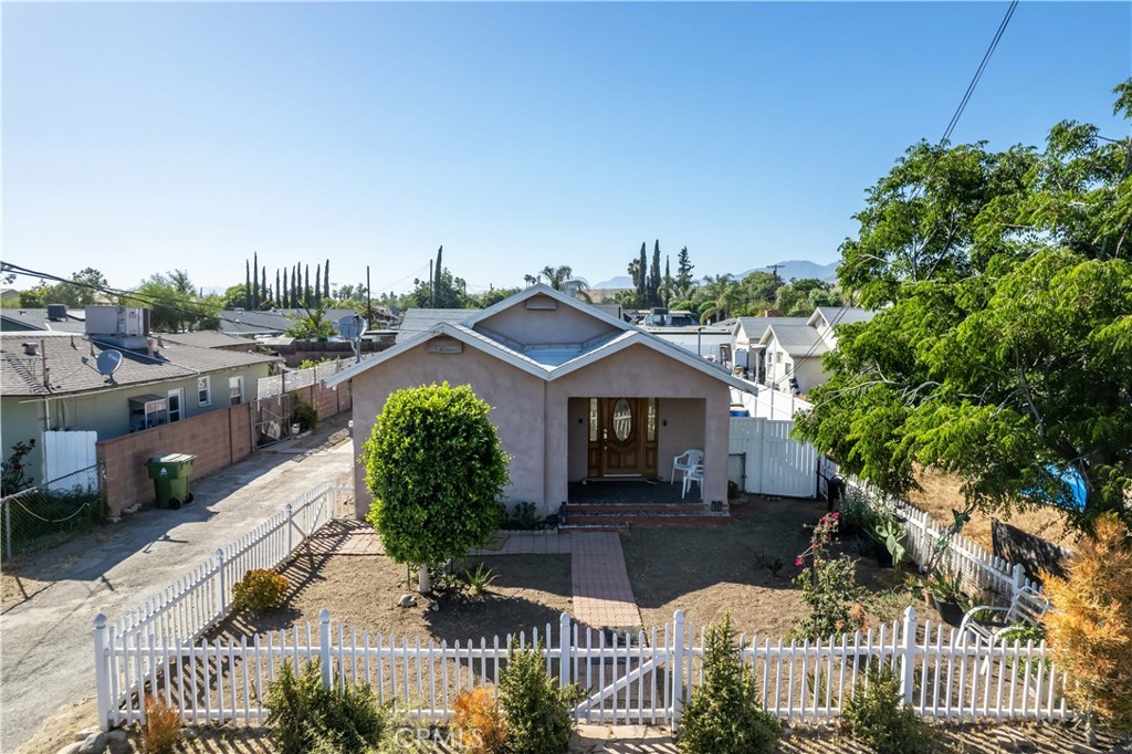 11203 Sheldon Street Sun Valley, CA 91352 - Photo 3 of 57 a view of a house with a big yard plants and large trees