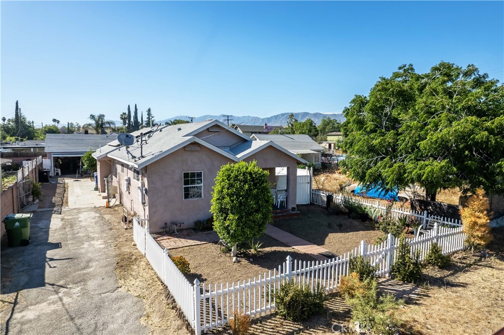 11203 Sheldon Street Sun Valley, CA 91352 - Photo 7 of 57 a view of a house with backyard and sitting area