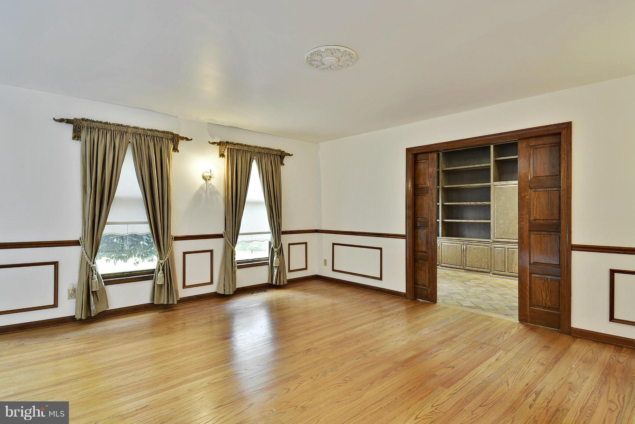 15737 Holly Grove Road Silver Spring, MD 20905 - Photo 2 of 30 Sun-drenched living room