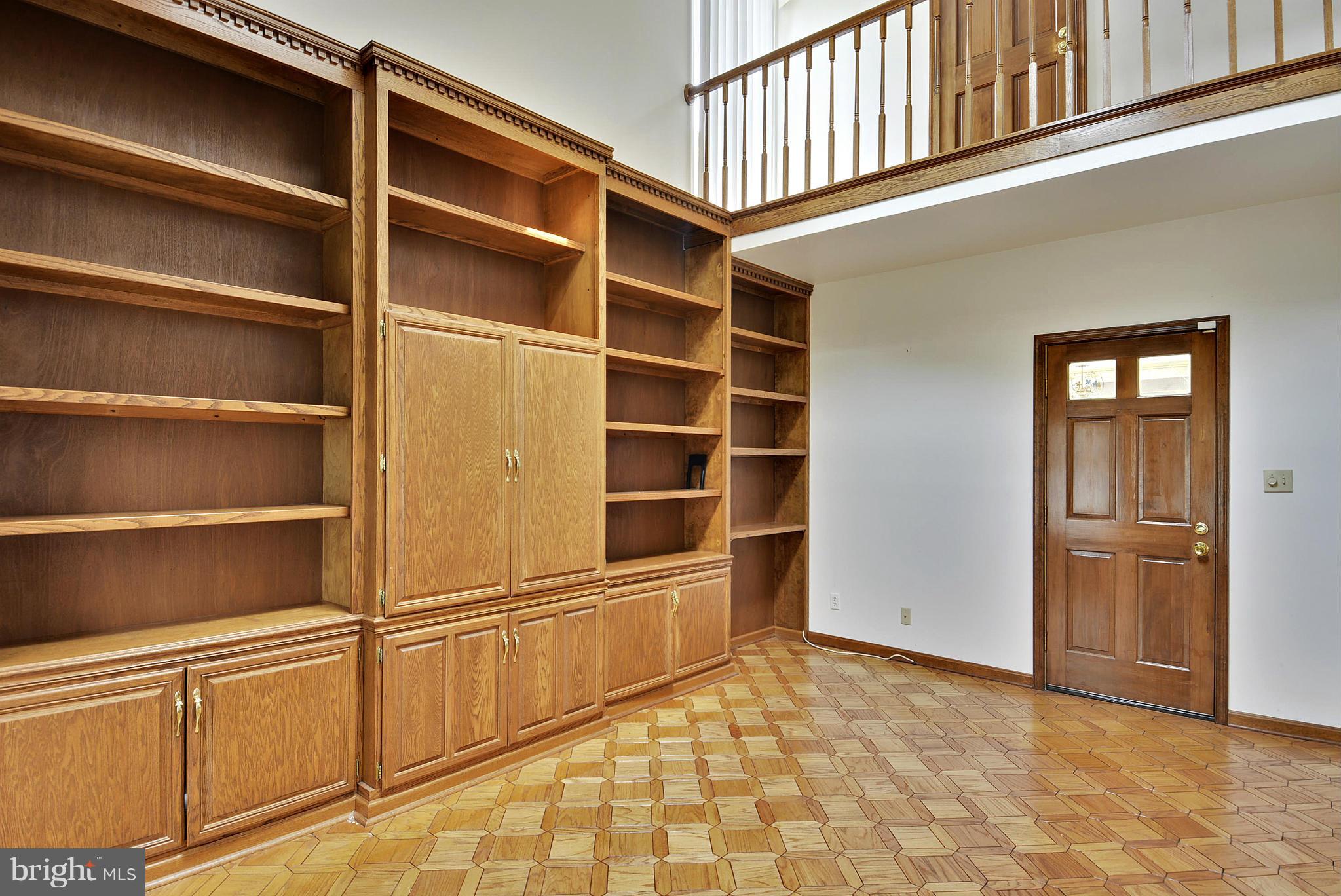 15737 Holly Grove Road Silver Spring, MD 20905 - Photo 12 of 30 Custom, shelving in den