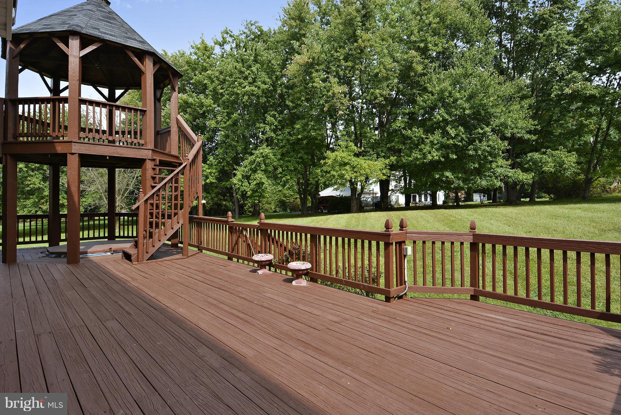 15737 Holly Grove Road Silver Spring, MD 20905 - Photo 14 of 30 Hot tub and gazebo enhance deck!