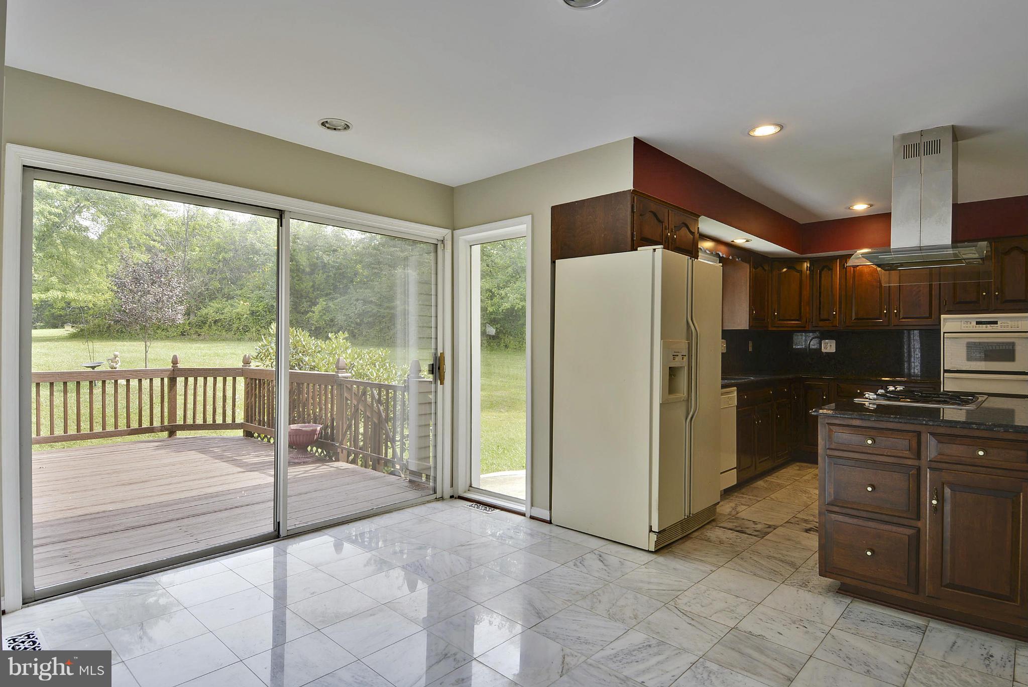 15737 Holly Grove Road Silver Spring, MD 20905 - Photo 15 of 30 Breakfast room - with exit to deck