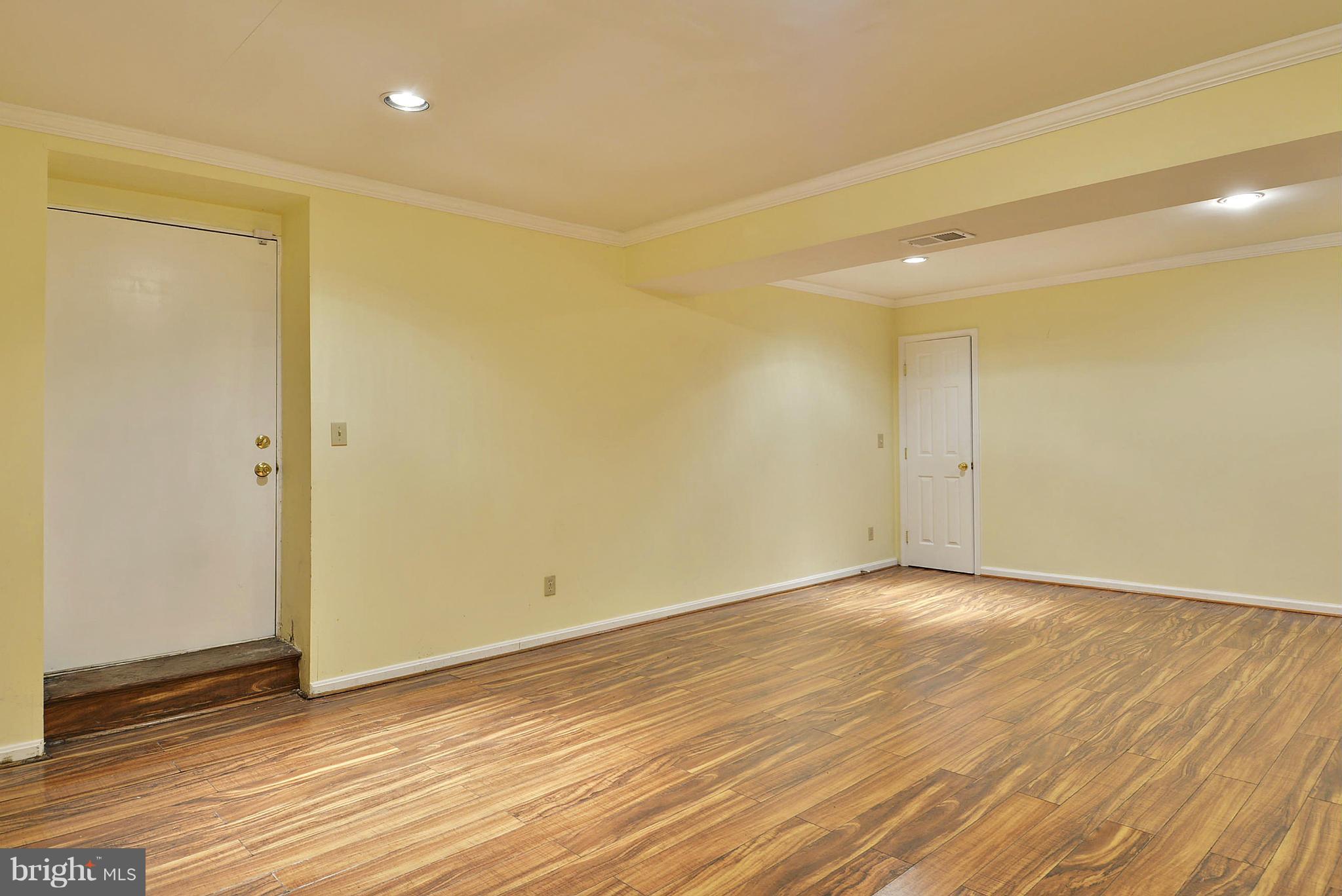 15737 Holly Grove Road Silver Spring, MD 20905 - Photo 27 of 30 Recessed lighting and easy care laminate flooring