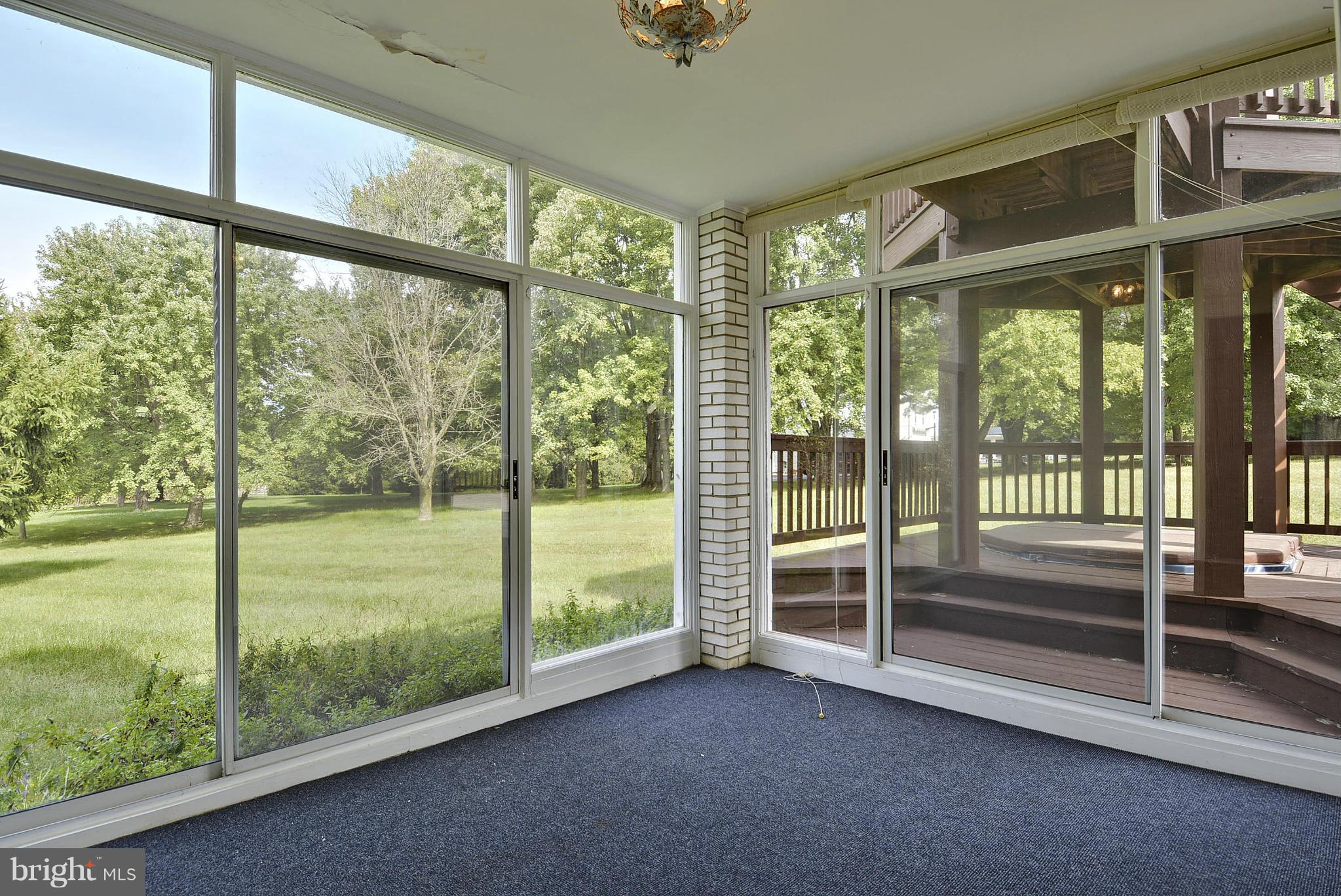 15737 Holly Grove Road Silver Spring, MD 20905 - Photo 4 of 30 Sun room