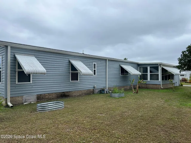 $175,000 | 1076 Royal Palm Drive, Barefoot Bay, FL 32976