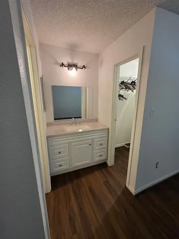 a room with furniture and flat screen tv