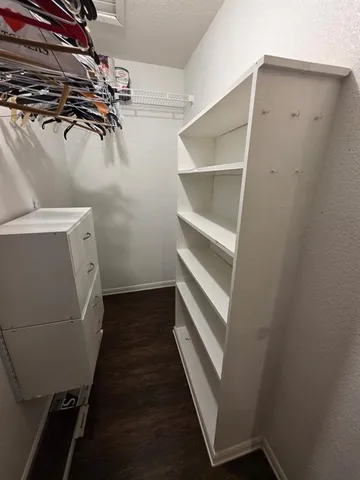 a view of a room with racks on the wall