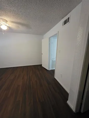 a view of small space with wooden floor