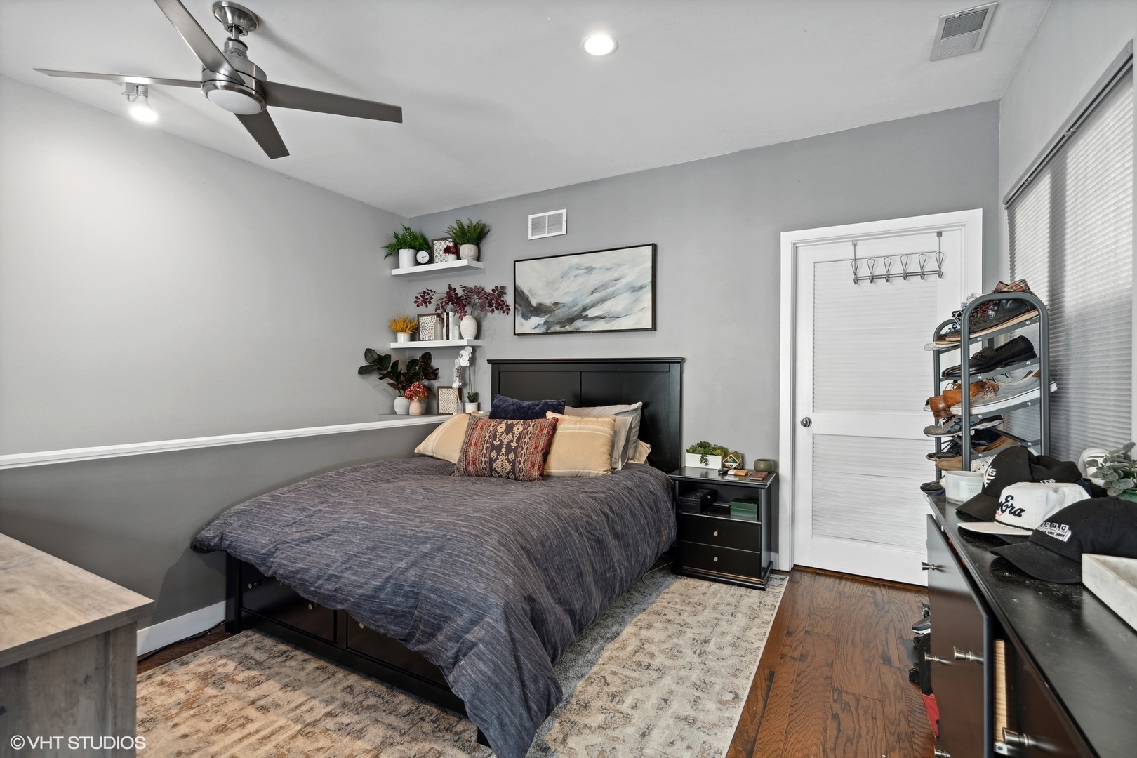 222 South Racine Avenue, Unit 607 Chicago, IL 60607 - Photo 13 of 22 a bedroom with a bed and wooden floor