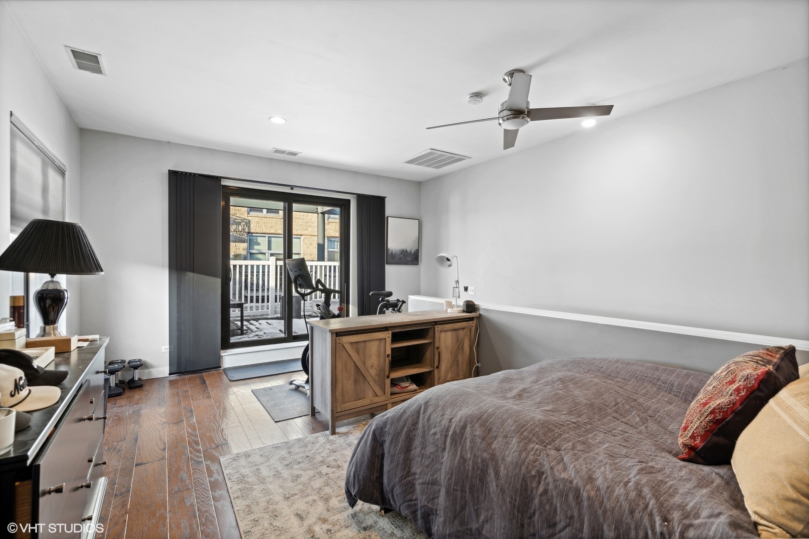 222 South Racine Avenue, Unit 607 Chicago, IL 60607 - Photo 14 of 22 a bed room with a bed and a chair