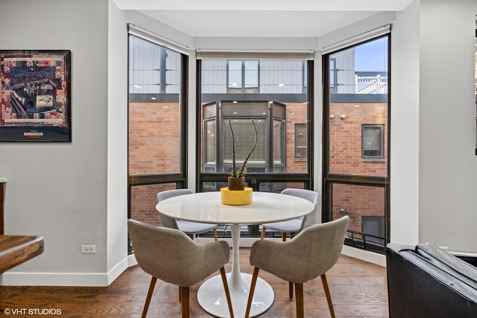 222 South Racine Avenue, Unit 607 Chicago, IL 60607 - Photo 7 of 22 a dining room with furniture and window