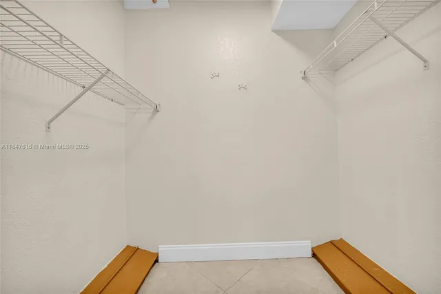 a view of a room with racks on the wall