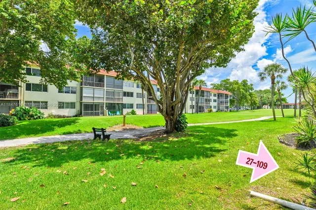 a garden view with a sitting space