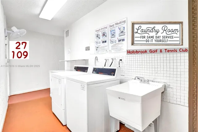 a utility room with dryer and washer