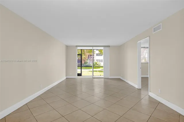 a view of an empty room with window