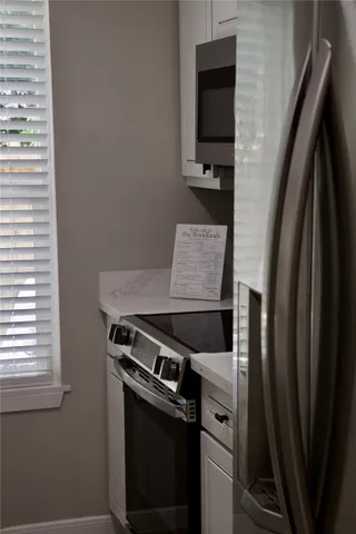 a close view of a stove and a kitchen